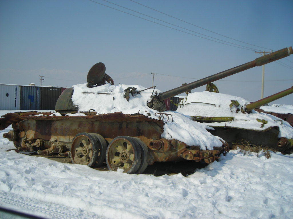 Soviet tanks left over from the Soviet War in Afghanistan. These scraps have been moved aside to make room for the U.S. military base near Kabul. / Russia Afghanistan