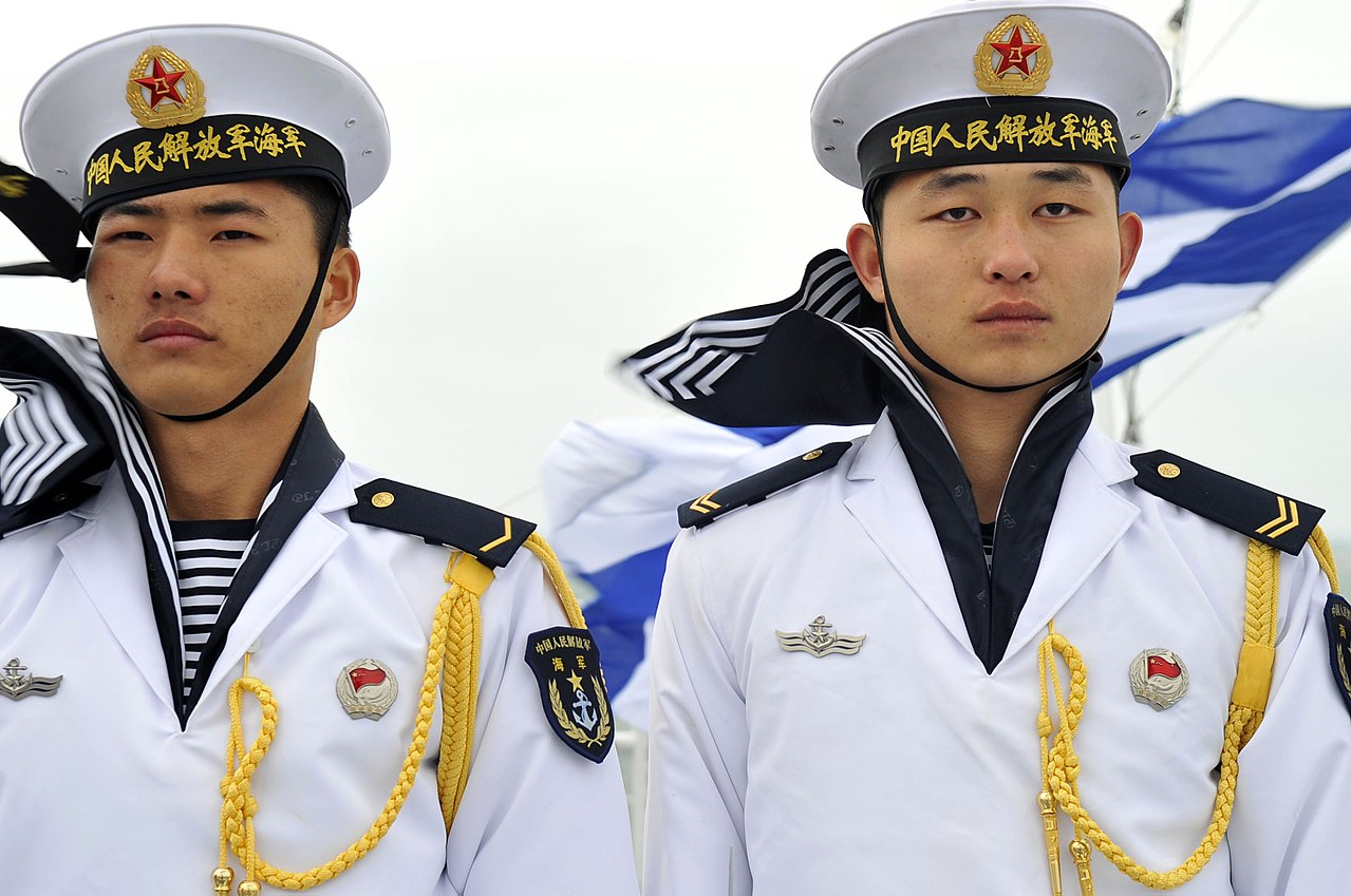 People's Liberation Army (PLA) Navy sailors stand at attention aboard the PLA Navy type 920 hospital ship Daishandao (AHH 866) in Quingdao, China, April 20, 2009. / South China Sea