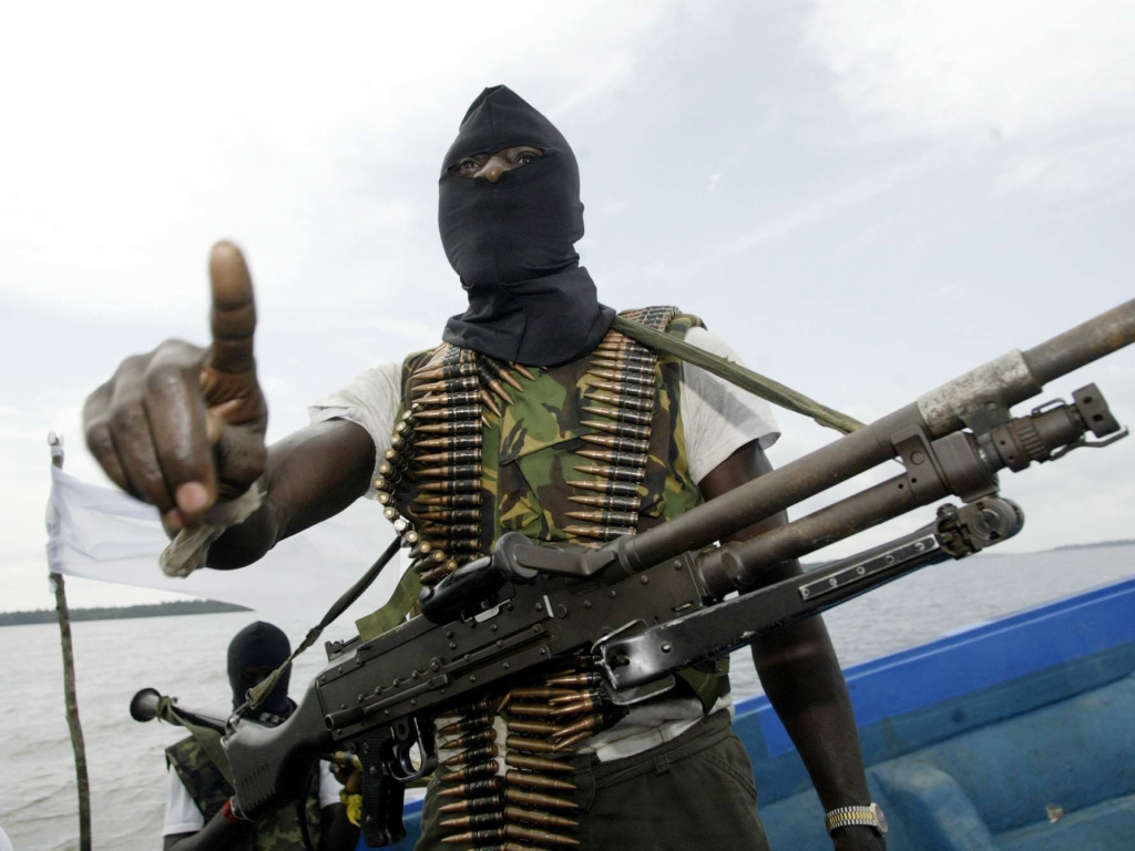 Militants patrolling the creeks of the Niger Delta area of Nigeria in 2006