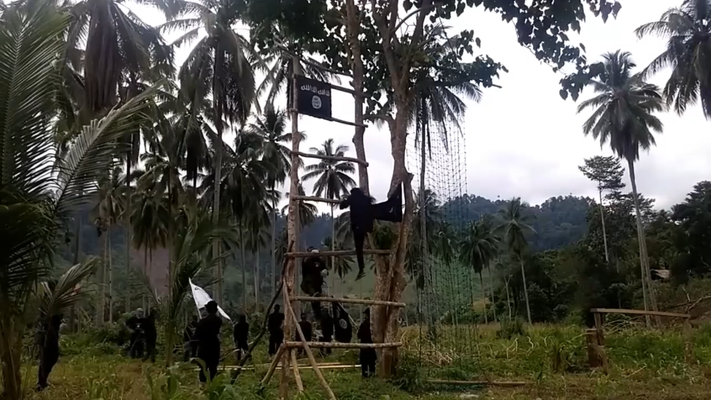 Jihadists are shown undergoing basic weapons training