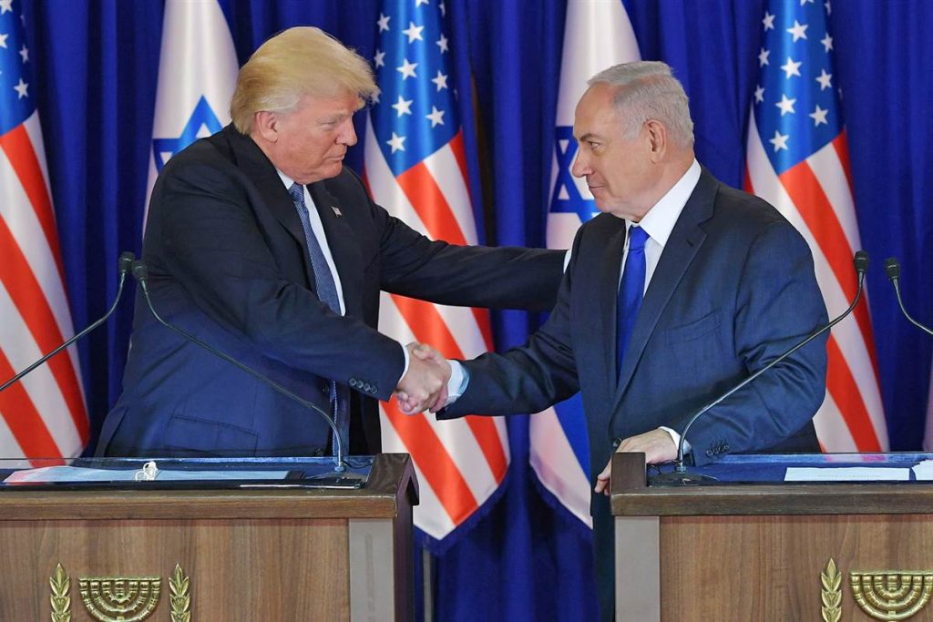 US President Donald Trump and Israel's Prime Minister Benjamin Netanyahu shake hands after delivering press statements