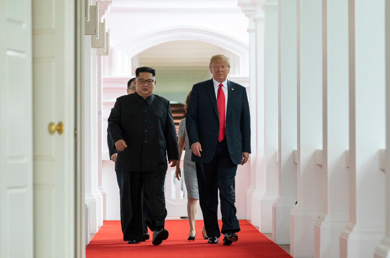 Kim and Trump walking to the summit room during the DPRK–USA Singapore Summit / Trump-Kim