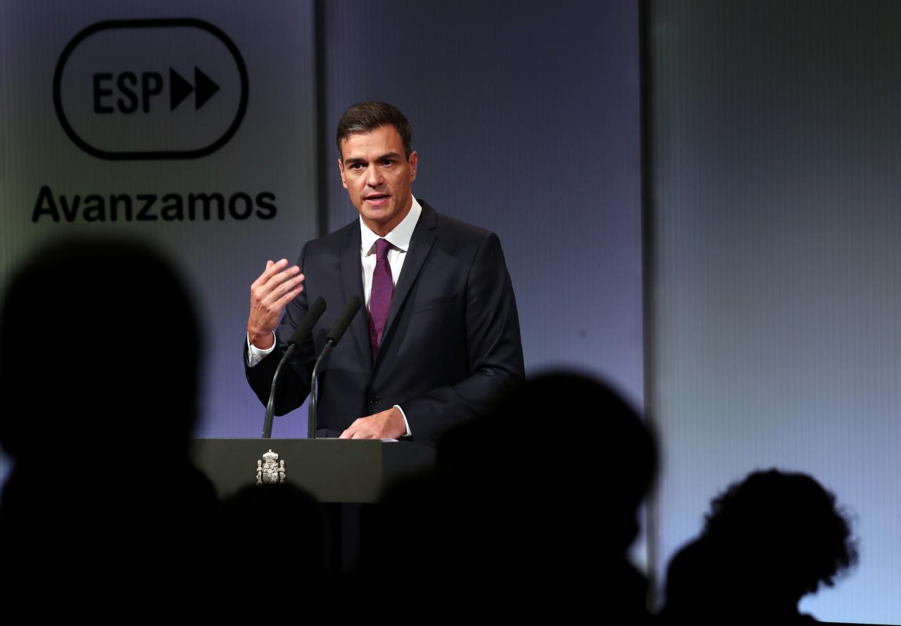 Spain’s PM Sanchez delivers a speech during an event marking the first 100 days of his government in Madrid