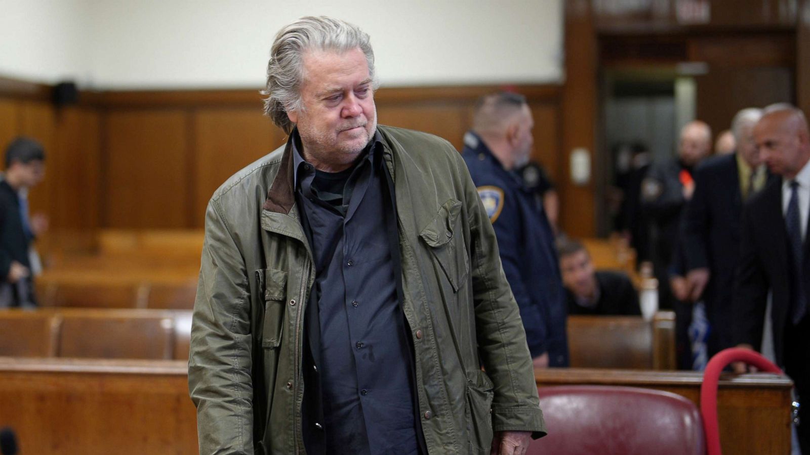 Steven Bannon standing in a U.S. courtroom