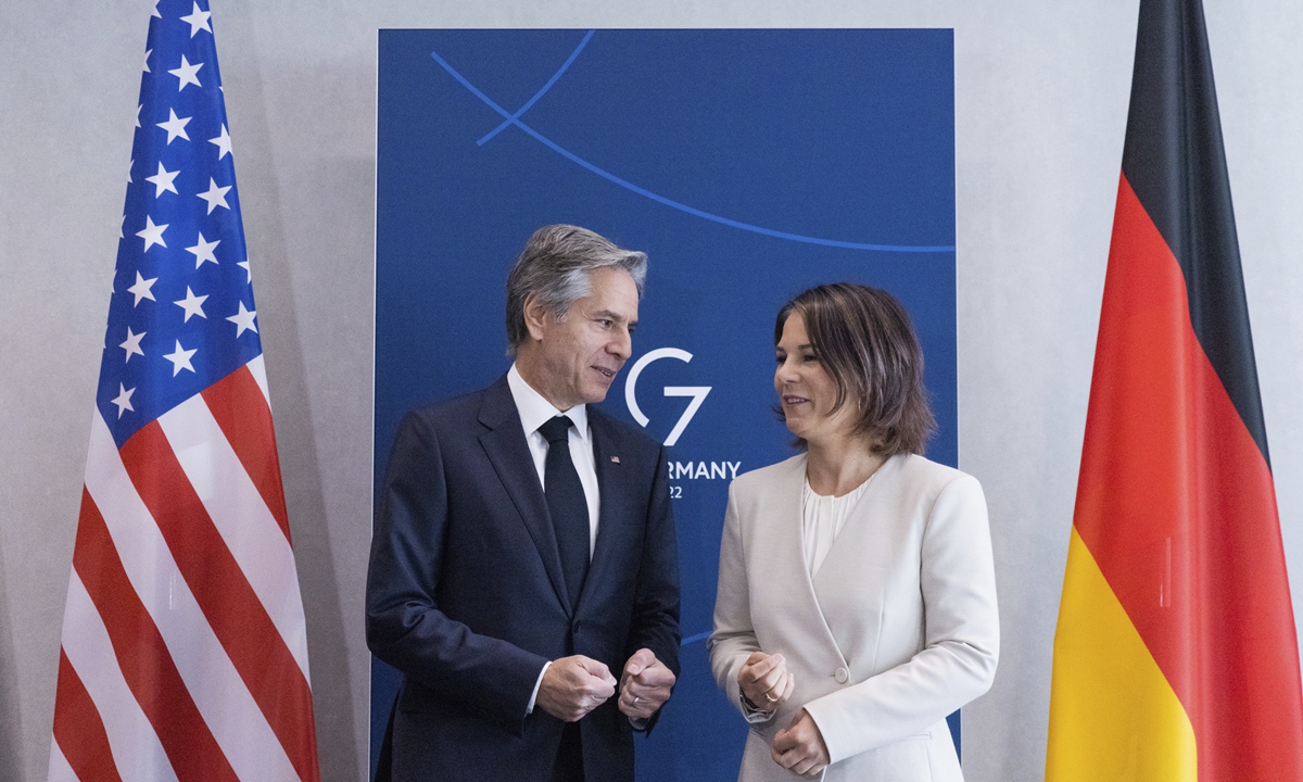 U.S. Secretary of State Anthony Blinken and German Foreign Minister Annalena Baerbock talking during the G7 Foreign Ministers meeting
