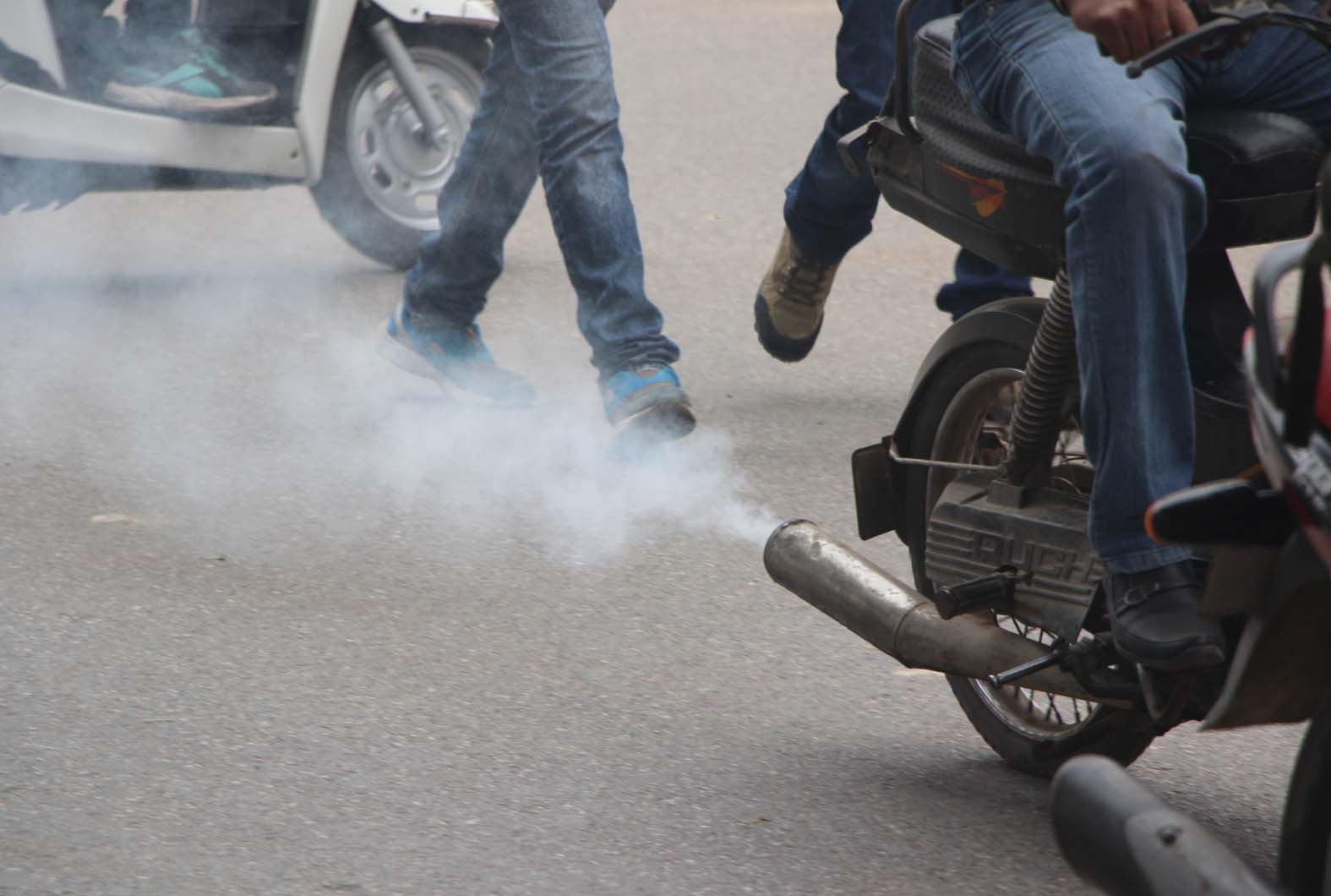 A motor cycle blowing exhaust in Jammu, which struggles with air pollution