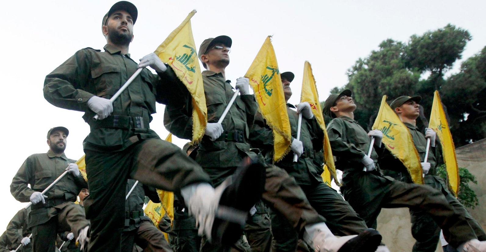Hezbollah fighters marching in Lebanon.