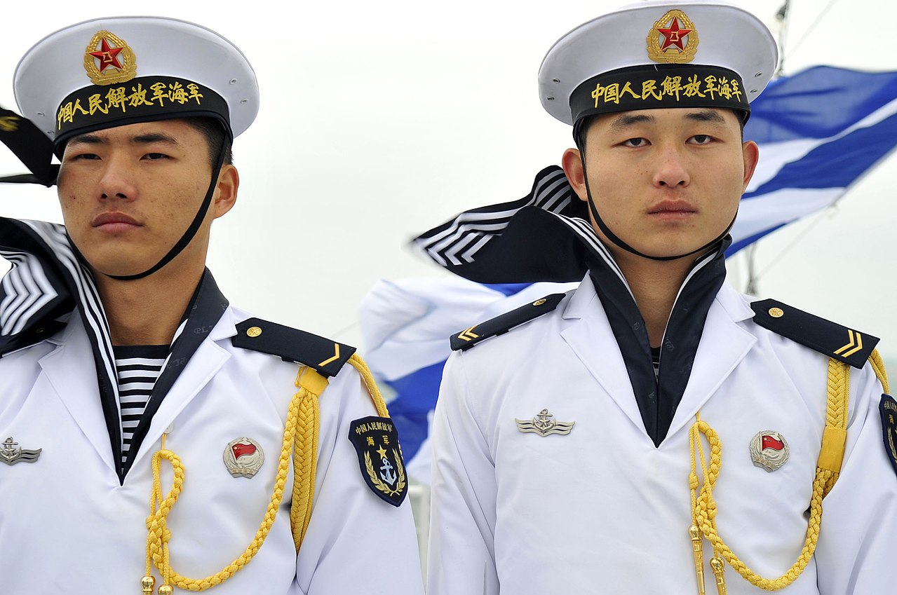 People's Liberation Army (PLA) Navy sailors stand at attention aboard the PLA Navy type 920 hospital ship Daishandao (AHH 866) in Quingdao, China, April 20, 2009. / South China Sea
