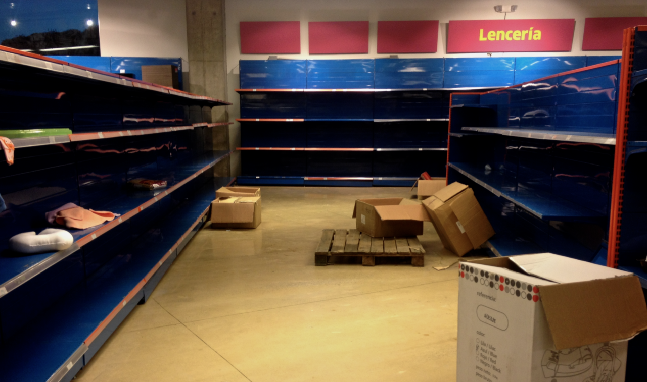 Empty store shelves in Venezuelan store in November 2013. / Venezuelan food shortages