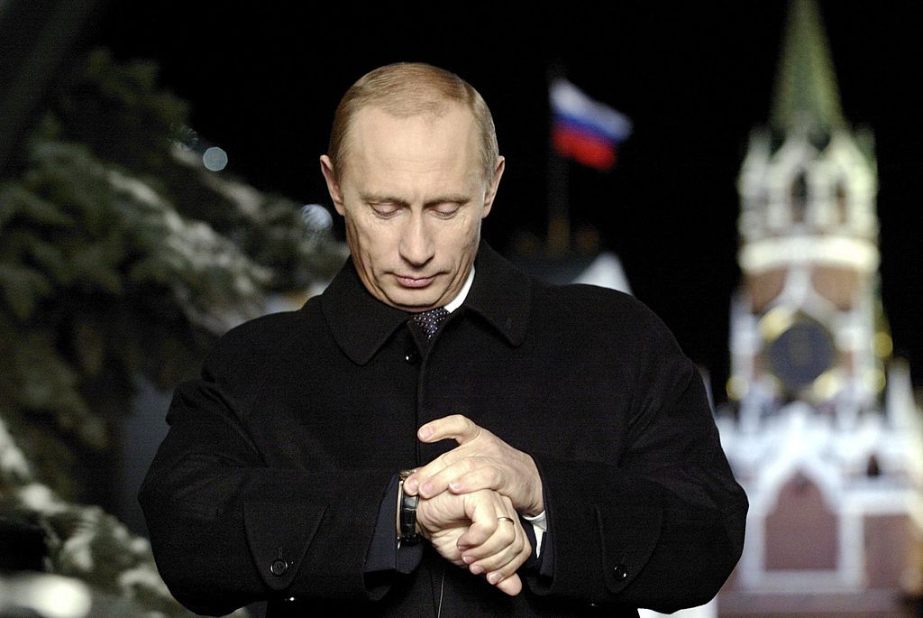 Russian President Vladimir Putin looks a