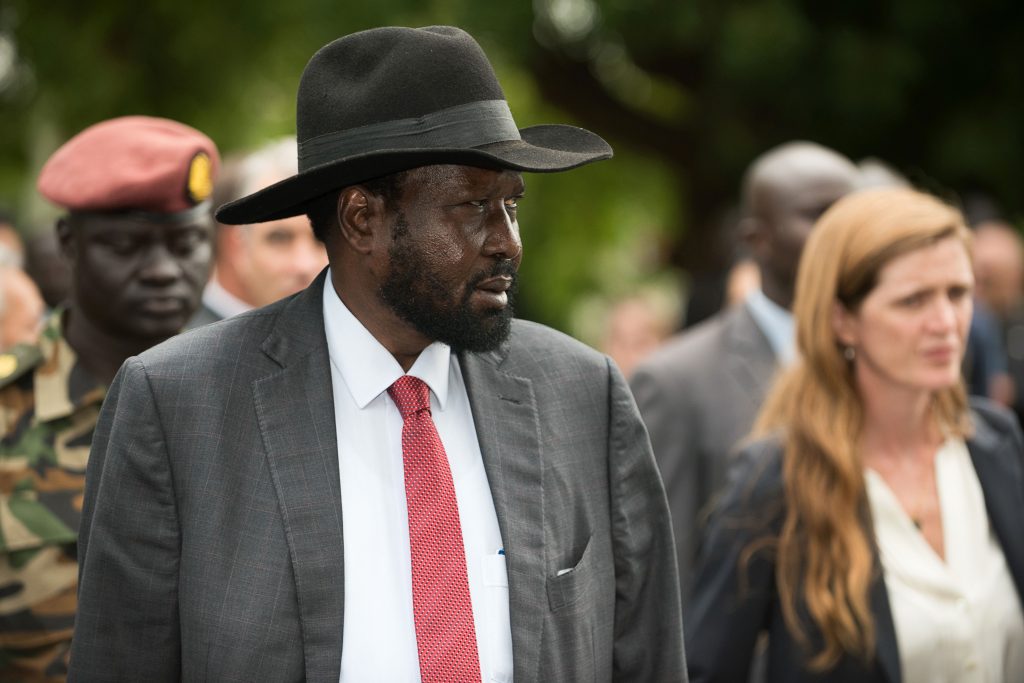 South Sudan President Salva Kiir (C) walks with a high delegation from the United Nations (UN) Security Council, including US Ambassador to the United Nations Samantha Power (R) during a tour of the South Sudan's state house, known as j1, to show the damages of fighting at the state house from July, on September 4, 2016, prior to a closed-door meeting.
