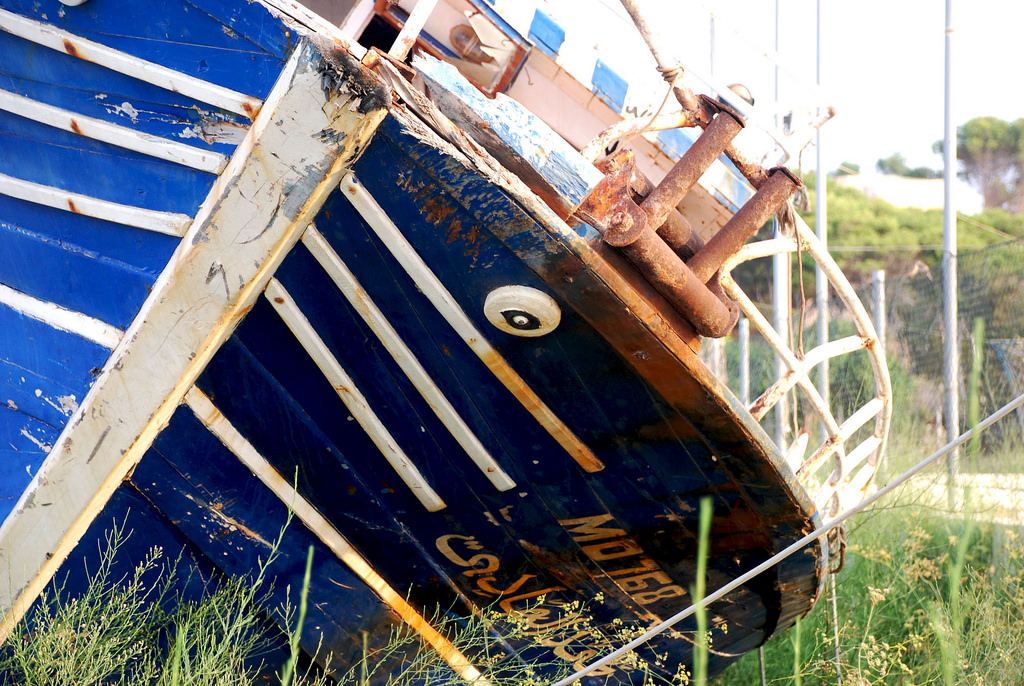 Abandoned ship used by migrants in Lampedusa / Libya deal