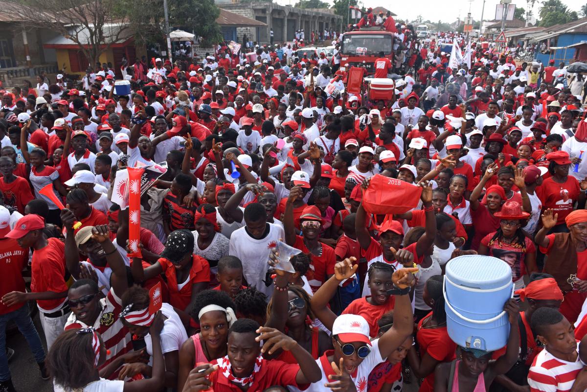 Supporters of the ruling All Peoples Congress (APC) party attend a rally ahead of the March 7 presidential election in Makeni