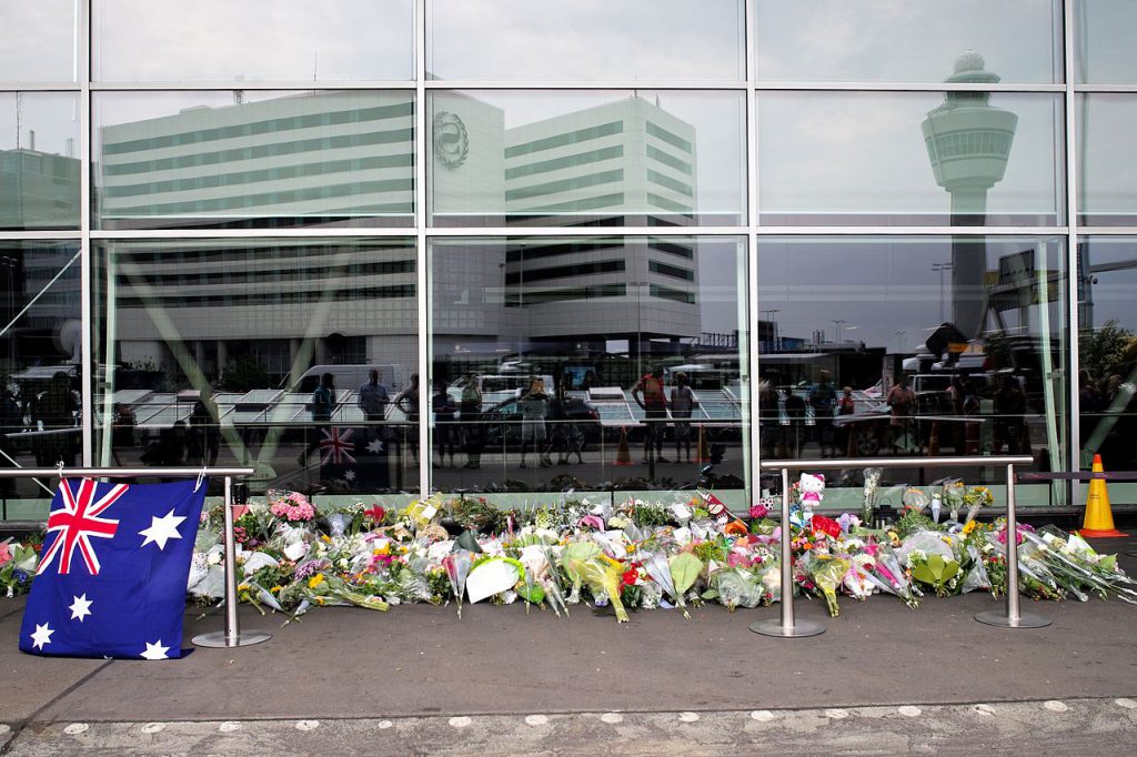 Makeshift memorial at Amsterdam Schiphol Airport for the victims of the Malaysian Airlines flight MH17 which crashed in the Ukraine on 18 July 2014 killing all 298 people on board / Australia-Russia relations
