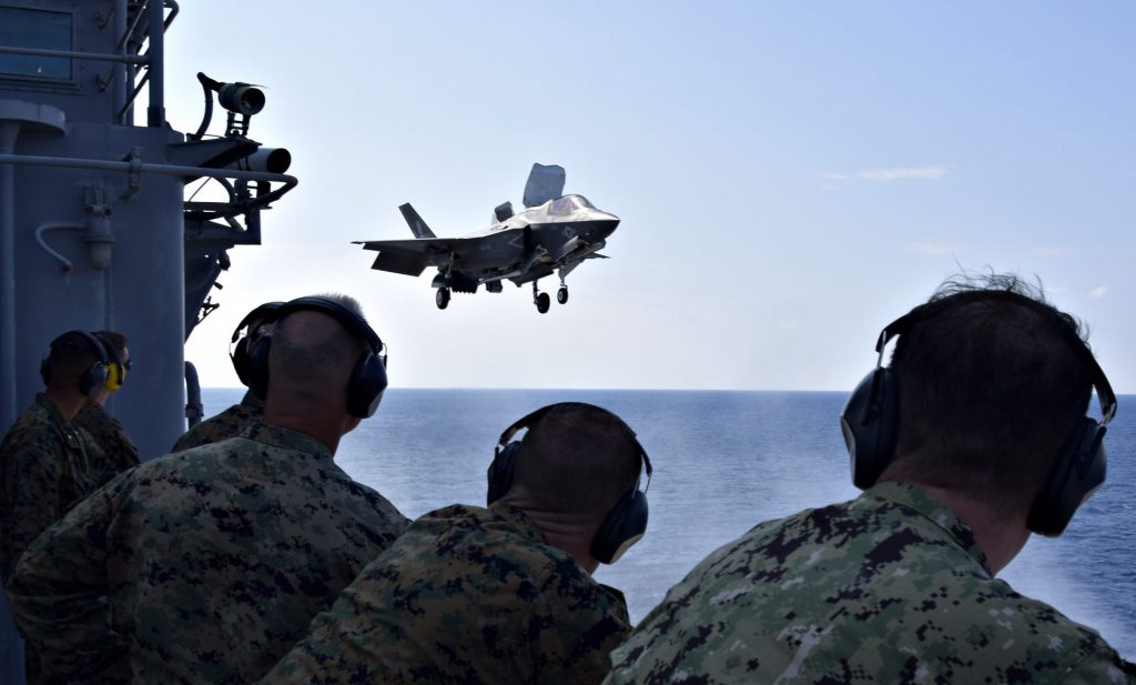 Marine Corps Lt. Gen. Lawrence Nicholson, commanding general of III Marine Expeditionary Force (III MEF) and his staff observe flight operations of the F-35B Lightning II aboard the amphibious assault ship USS Wasp (LHD 1) during a tour of the ship in the Indo-Pacific region. / Chinese bomber