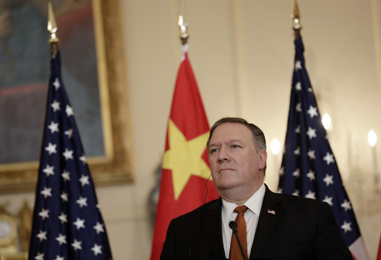 U.S. Secretary of State Mike Pompeo listens to China’s Foreign Minister Wang Yi during joint news conference at the State Department in Washington