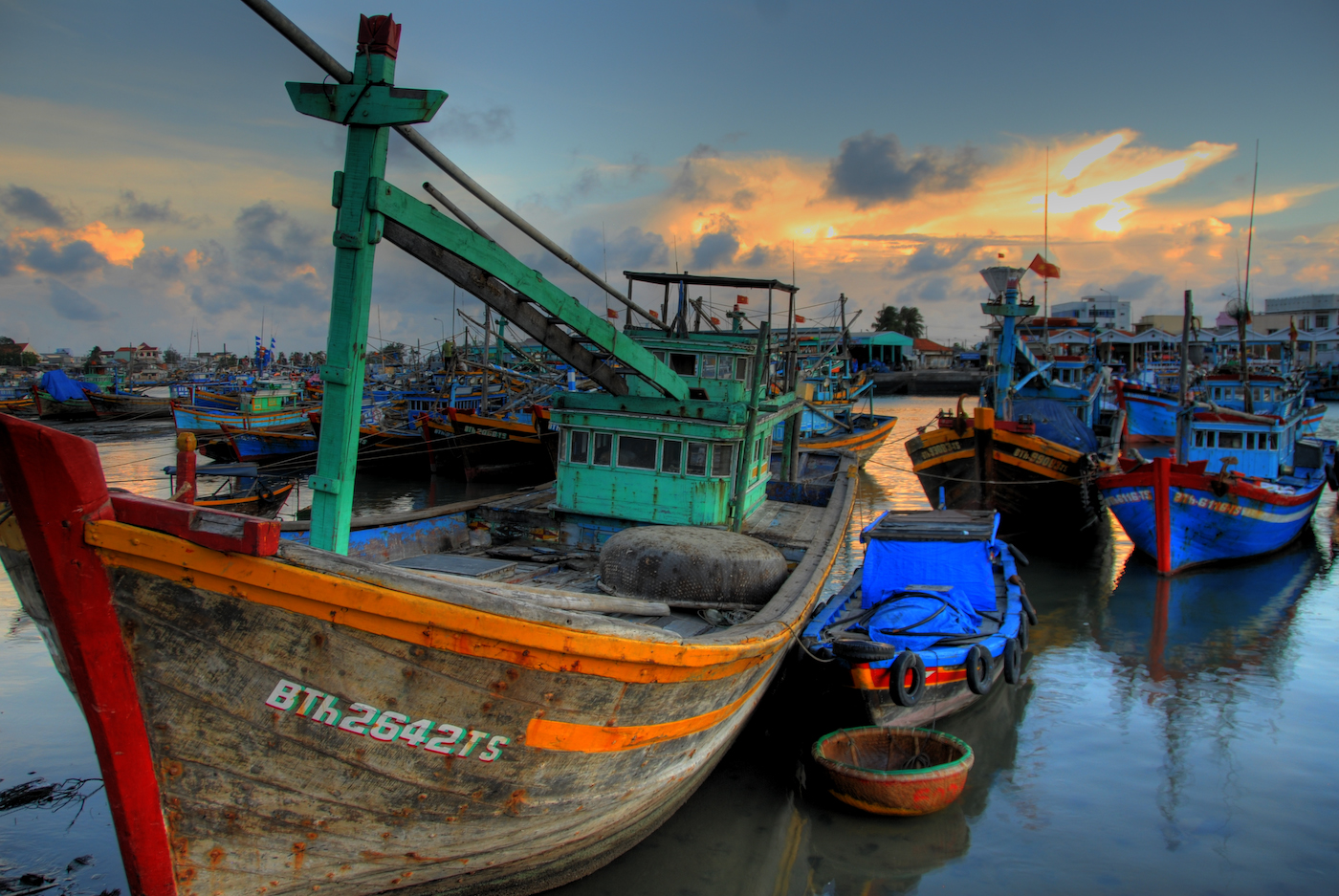 Much of the world's shrimp supply comes from small ports like these lining the Vietnam coast along the East Sea. / fishing militia