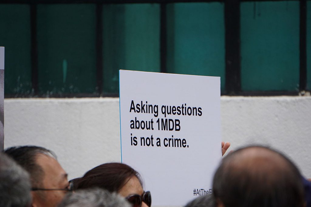 A placard at Malaysian journalists protest against suspension of The Edge Financial and for media freedom / 1MDB
