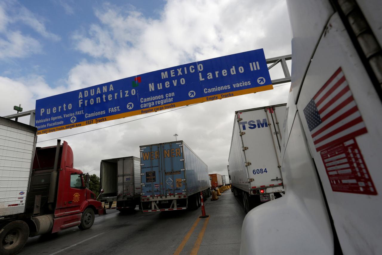 Trucks wait in the queue for border customs control to cross into U.S. at the World Trade Bridge in Nuevo Laredo