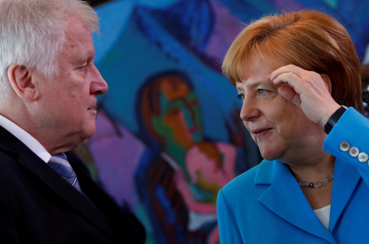 FILE PHOTO: Merkel, Seehofer talk in Berlin