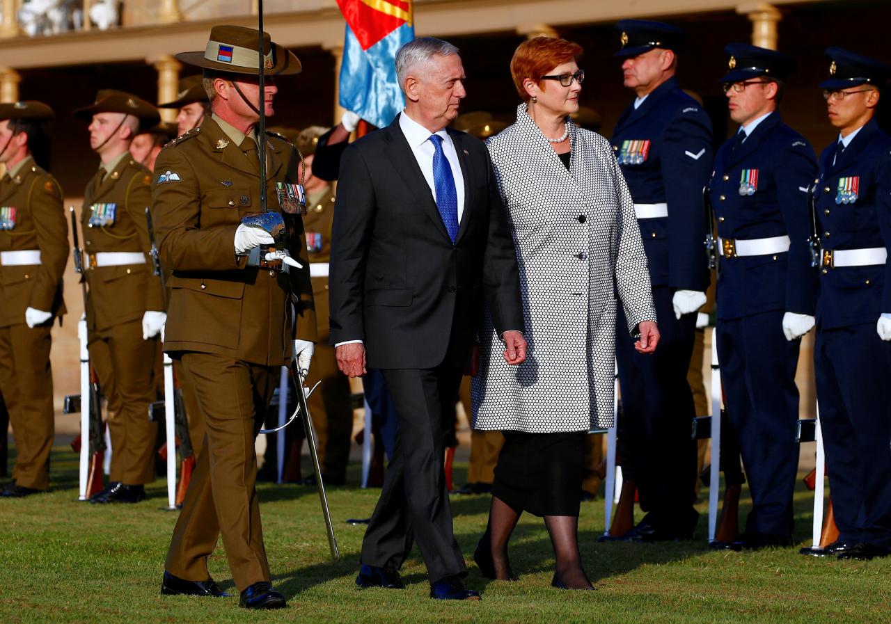 U.S. Secretary of Defence Jim Mattis walks with Australia’s Minister for Defence Marise Payne during an inspection of an honour guard at the Australian Army’s Victoria in Sydney