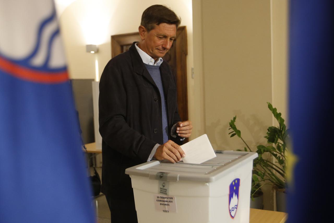 Presidential candidate Borut Pahor casts his ballot at a polling station during the presidential election in Sempeter pri Novi Gorici