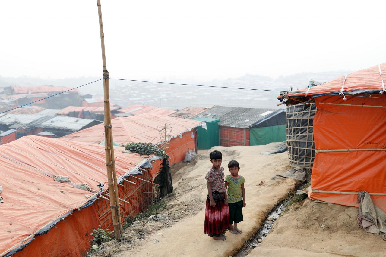 Rohingya refugee children walk in Palong Khali camp, near Cox’s Bazar