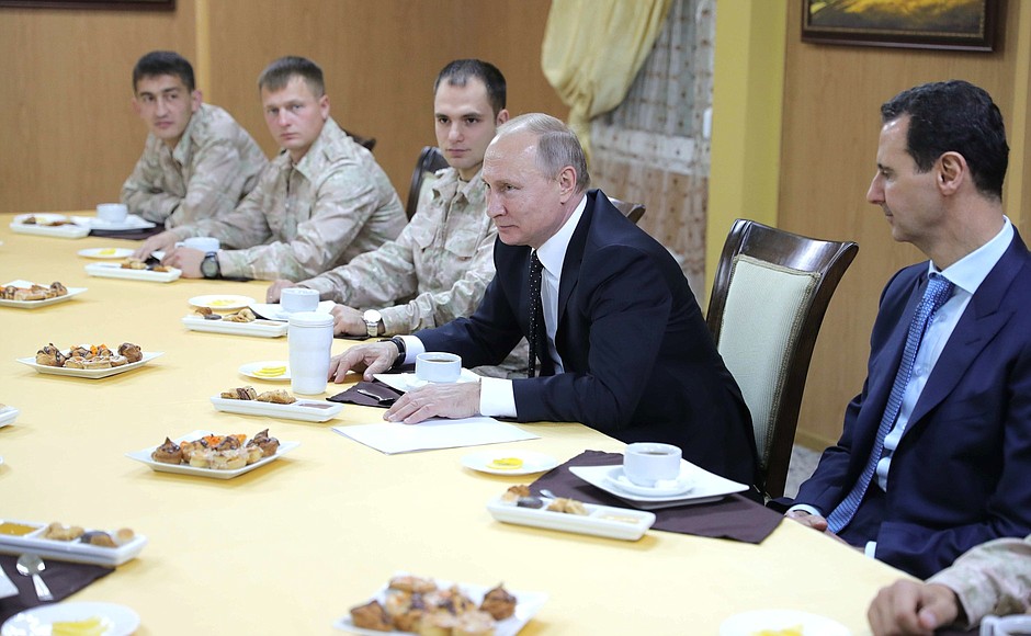 At the Khmeimim air base in Syria. With the Russian and Syrian military who took part in the counterterrorism operation. / Idlib