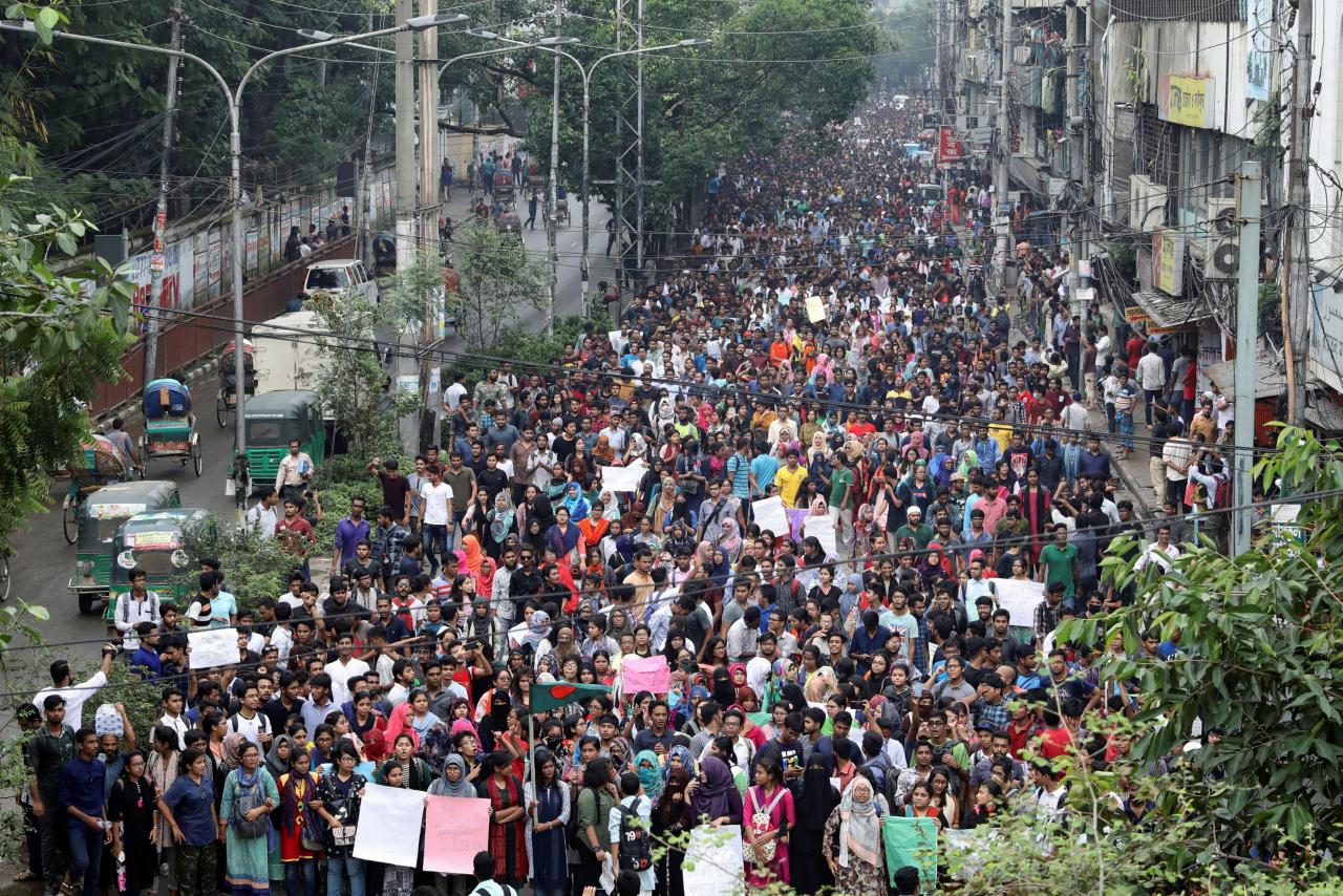 Thousands of students join in a protest over recent traffic accidents that killed a boy and a girl, in Dhaka