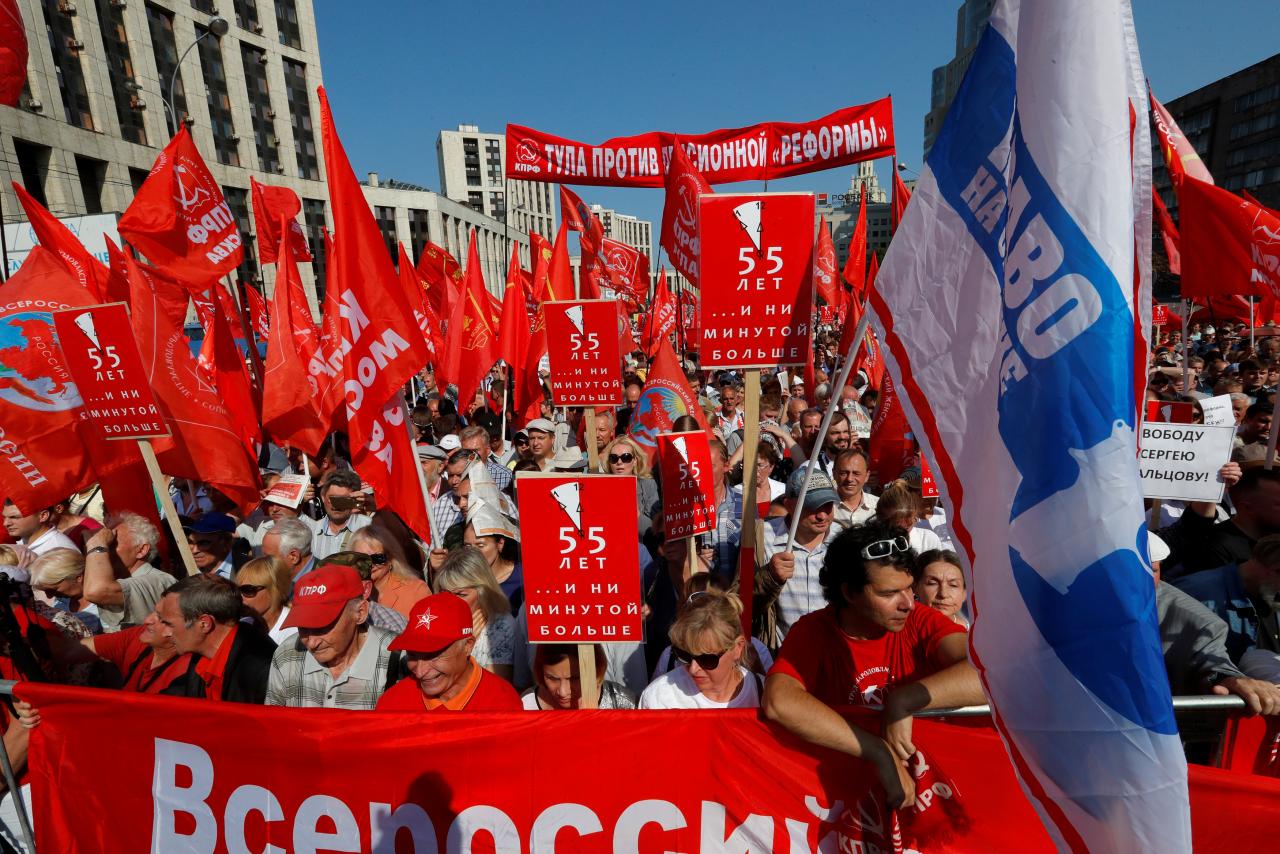 People attend a protest against a proposed increase of the retirement age in Moscow