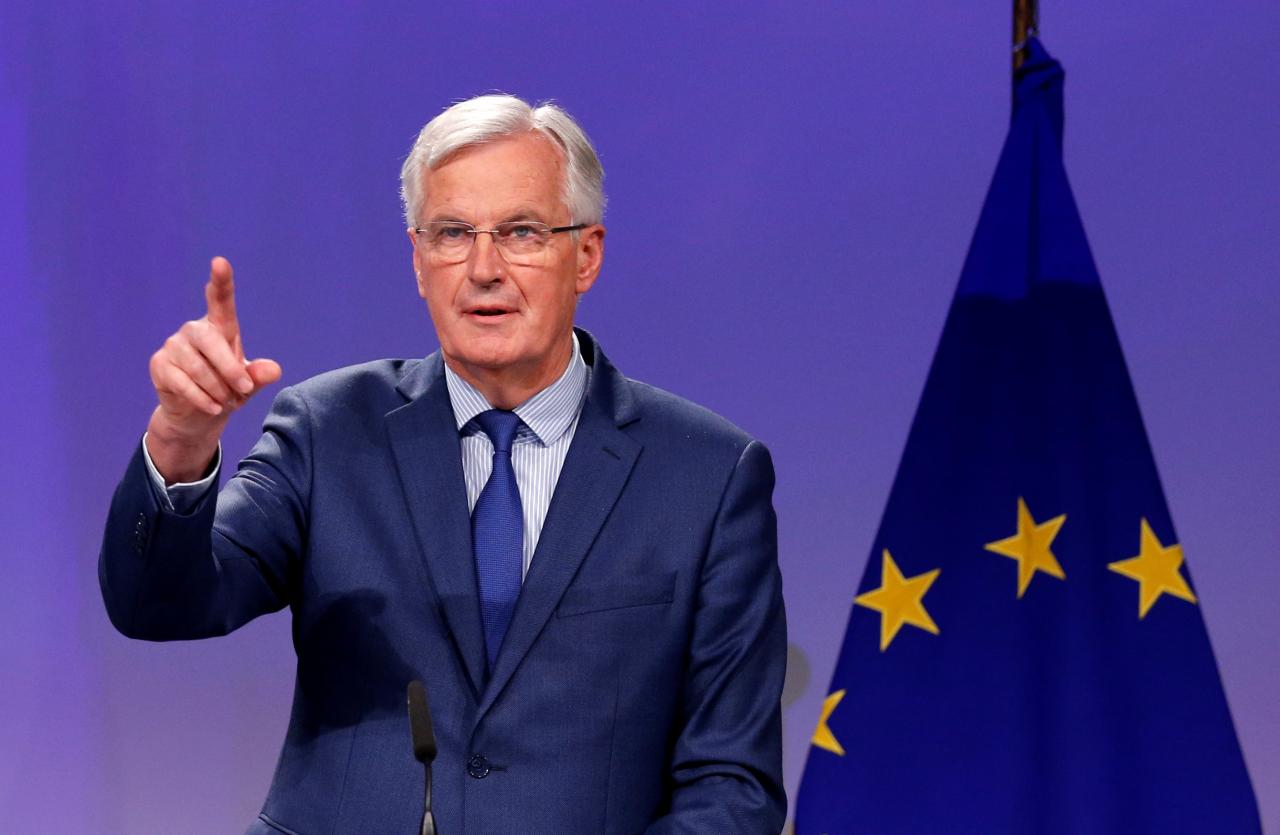 EU’s chief Brexit negotiator Barnier holds a joint news conference with Britain’s Secretary of State for Exiting the EU Davis in Brussels