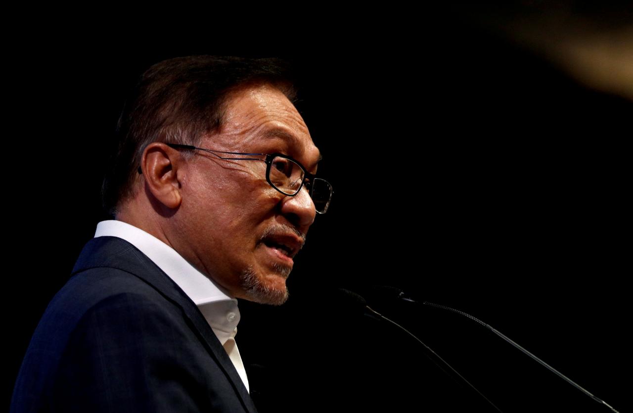 FILE PHOTO: Malaysian politician Anwar Ibrahim speaks during the Singapore Summit in Singapore