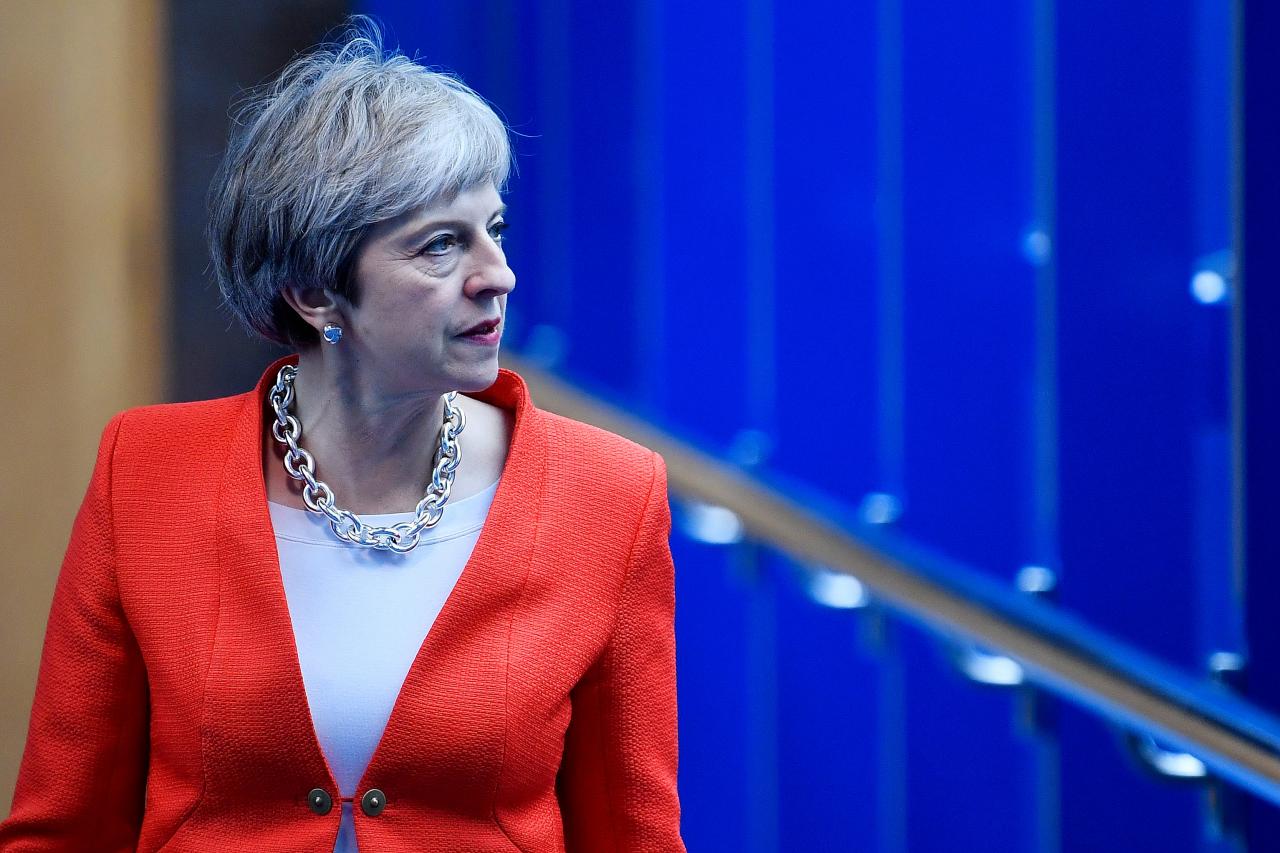 Britain’s Prime Minister Theresa May walks to the Conservative Party Conference in Birmingham