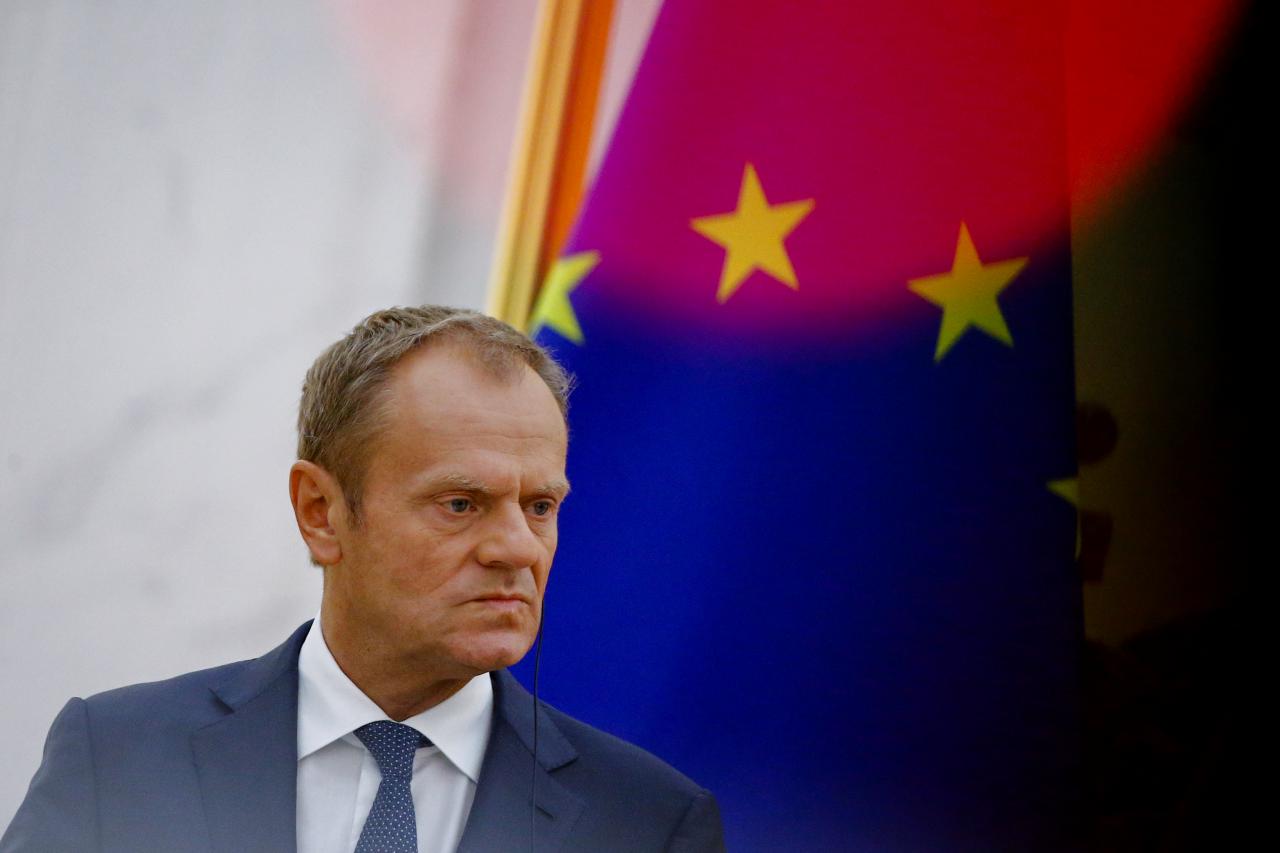 European Council President Donald Tusk attends a news conference at the Great Hall of the People in Beijing