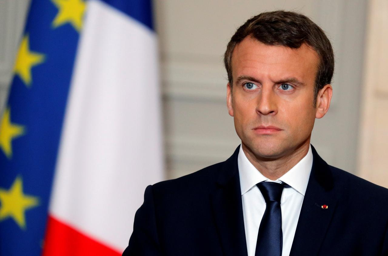 French President Emmanuel Macron attends a press conference at the Elysee Palace in Paris