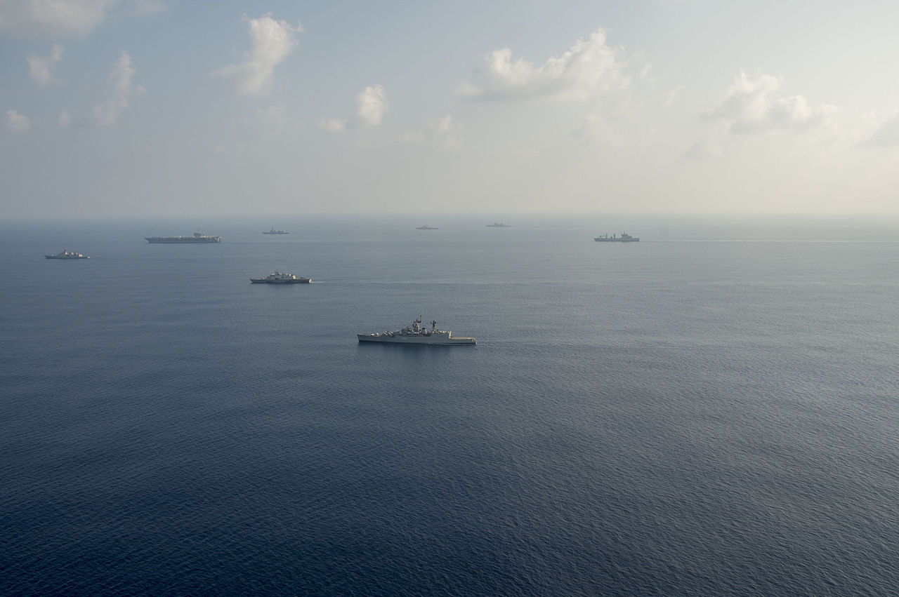 Ten ships and submarines from the Indian, Japanese and U.S. navies maneuver into a close formation during Exercise Malabar 2015. / Indian Ocean policy