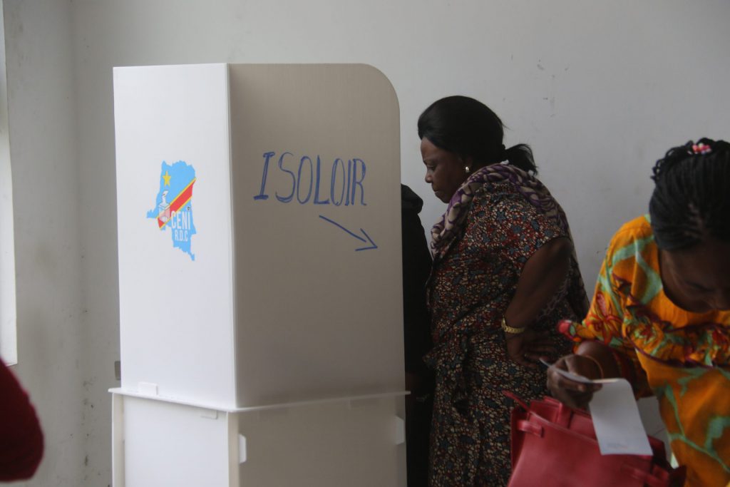 Kinshasa,DR Congo: Voters casting votes during Presidential and Legislative elections in Kinshasa. / Ebola