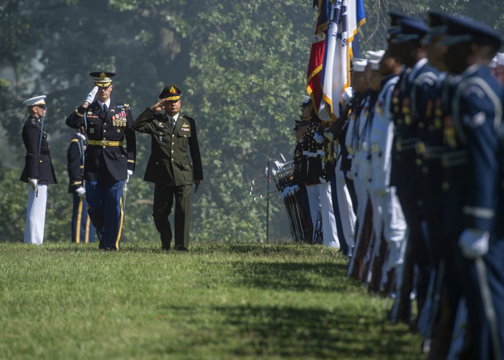 Thai Army Gen. Tarnchaiyan Srisuwan, chief of the Defense Force, inspects a Joint Force Honor Guard during an honors ceremony at Whipple Field, Fort Myer, July 9, 2018 / Thailand election