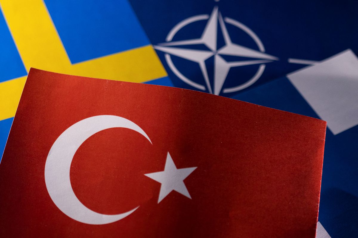 The flags of Sweden, Finland, Turkey and NATO