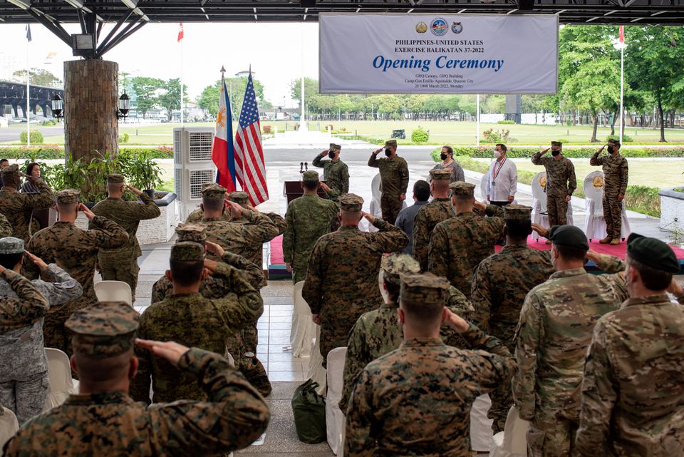Soldiers salute during joint military drills between the U.S. and Philippines