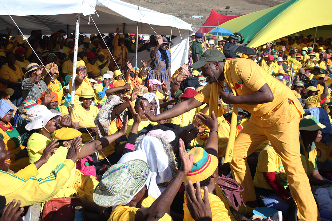 The All Basotho Convention (ABC) leader Nkaku Kabi (R) greets supporters at the ABC last electoral campaign rally five days ahead of the vote for the general elections in Maseru on October 02, 2022.
